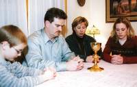 photo of Reindl family praying for vocations