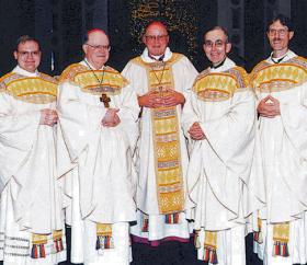 photo of three newly ordained priests with Bishop Bullock and Auxiliary Bishop Wirz