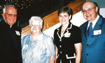 photo of Sandy Zweifel (third from left) with Msgr. Jim Kramer, Sr. Mary Montgomery, and Jim Silver