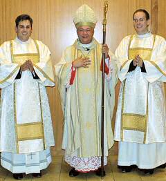 photo of Bishop Morlino with Rev. Eric Sternberg, left, and Rev. Michael Radowicz