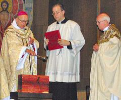 photo of Bishop Bullock, bishop emeritus, blessing St. Raphael Cathedral time capsule