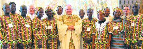 photo of members of delegation from Diocese of Navrongo-Bolgatanga in Ghana with Bishop Robert C. Morlino and Ben Weisse