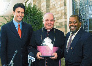 photo of Bishop Robert C. Morlino receiving the Lifetime Achievement Award from the Congress of Racial Equality and the Alliance for Marriage